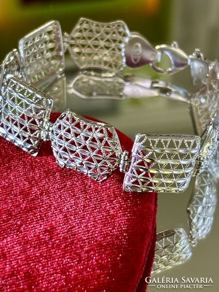 Beautiful silver bracelet with an openwork pattern