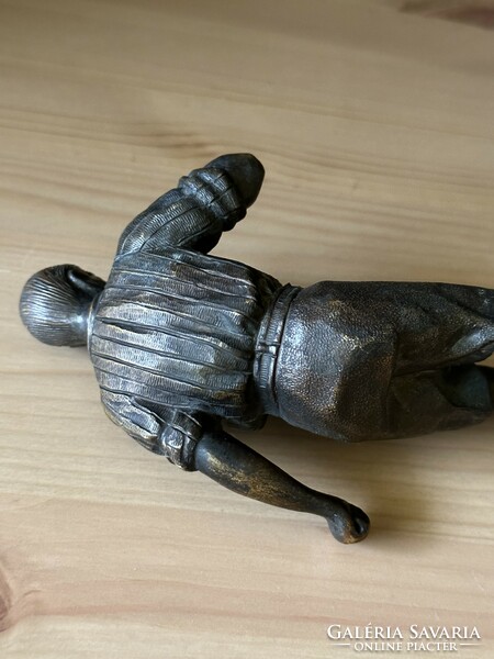 Antique bronze soccer player statue, damaged