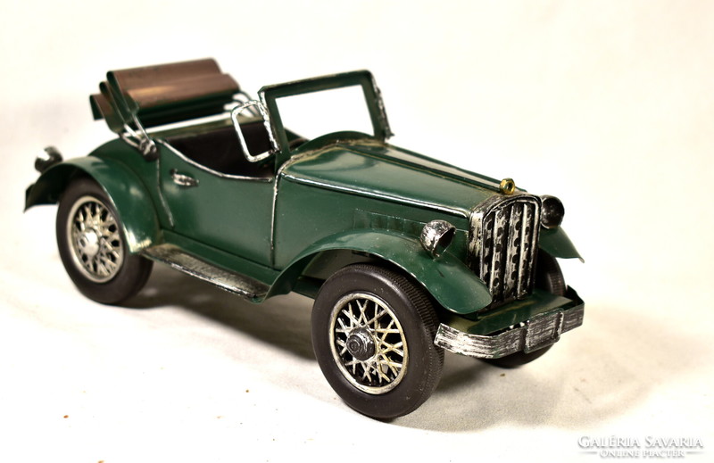 Old timer car model with metal housing