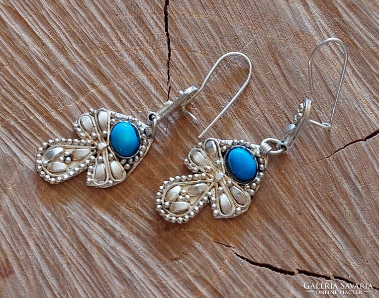 Silver earrings with a turquoise stone