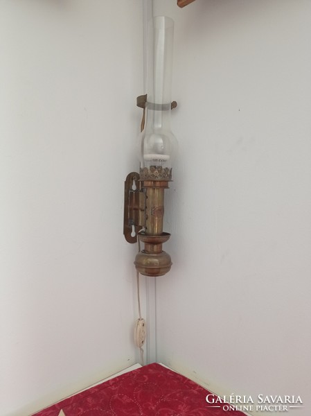 Retro wall electric lamp in the shape of a kerosene lamp