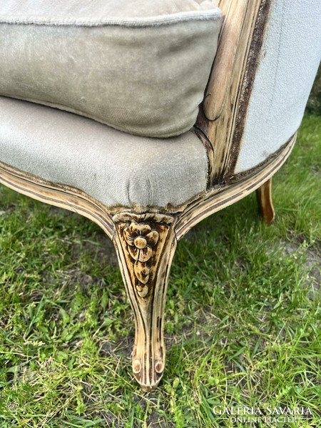 Beige antique armchair