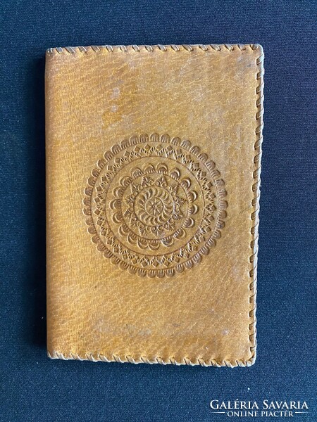 Leather wallet with printed decoration. Old but never used. Size: 10x15 cm