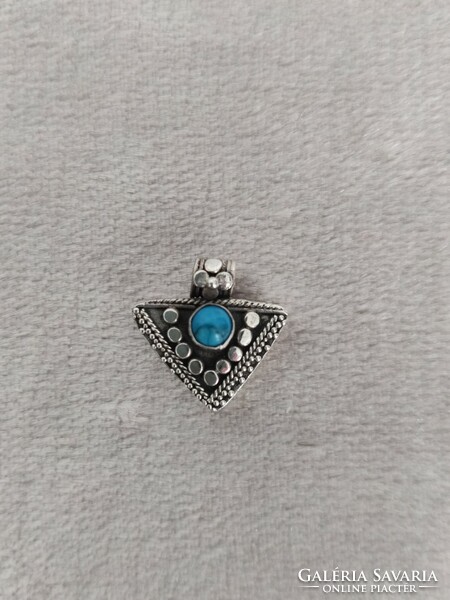 Very graceful small silver pendant with turquoise stones from Peru
