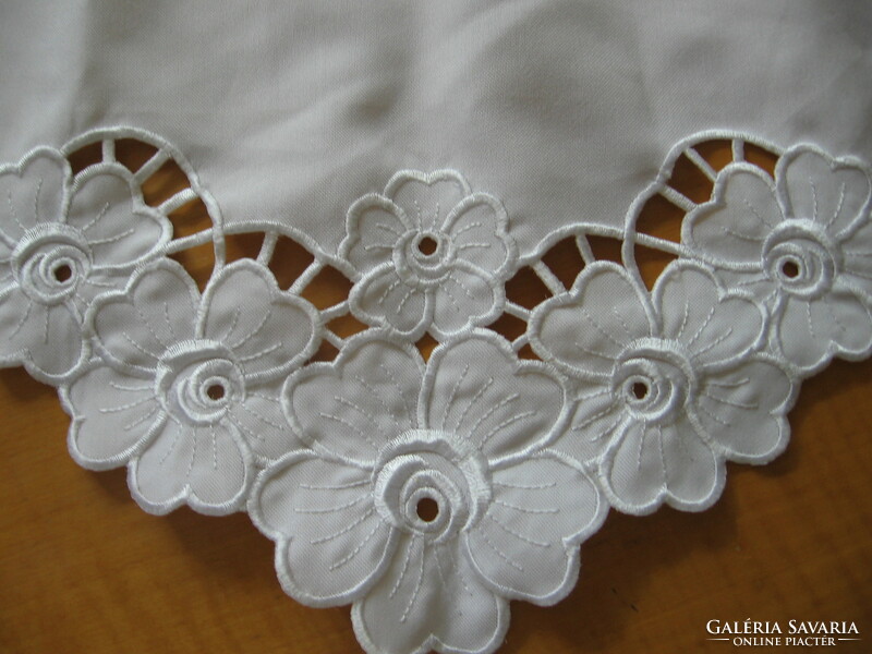 Machine-embroidered tablecloth with a rose pattern