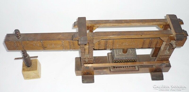 Meticulously crafted idol press model made of wood