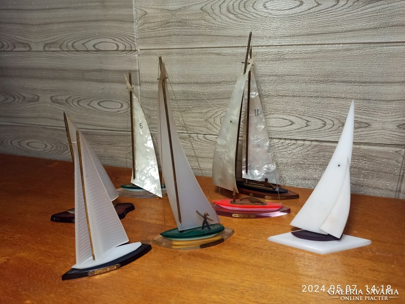 A collection of 7 balaton ship models