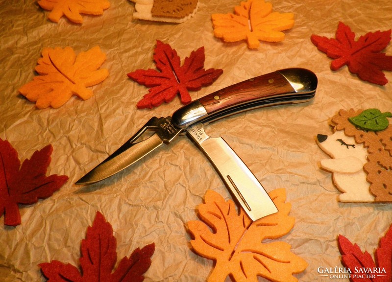 Two bladed knives, from a collection.