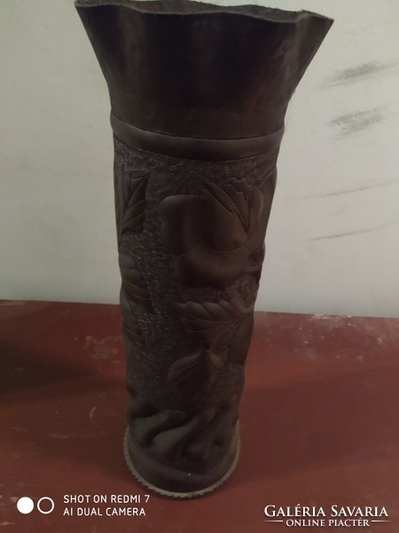 Copper sleeve vase with hammered flower representation