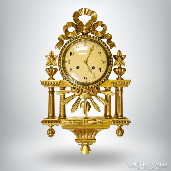 Baked gilded wall clock