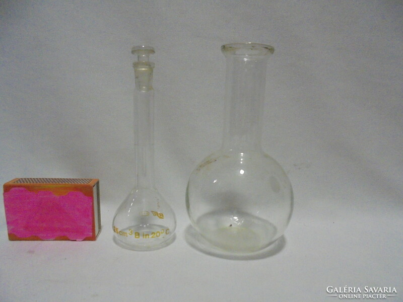 Two small flask bottles together - pharmacy, medical, chemical