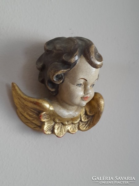 Antique carved wooden angel