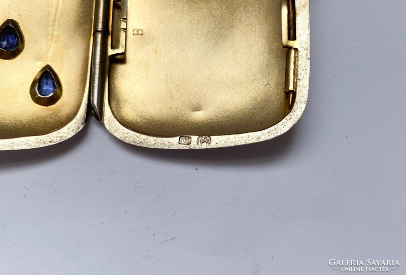 Art Nouveau women's silver cigarette case with precious stones.