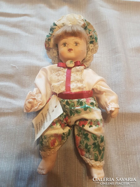 Cute porcelain head doll in perfect condition