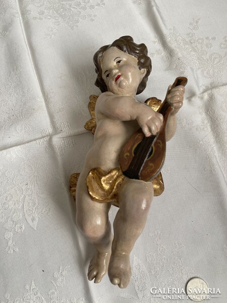 Large hand-painted 27 cm high putto.