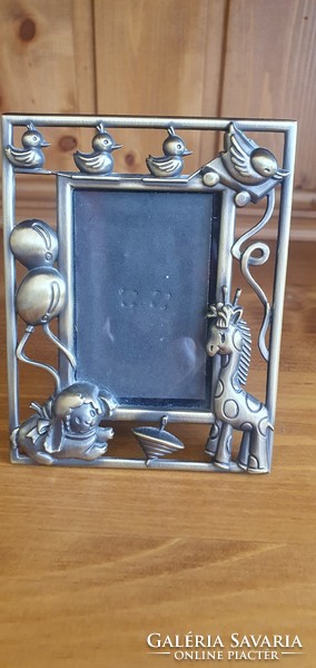 Photo frame, photo holder, photo frame made of metal