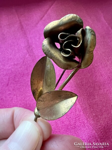 Antique metal rose-shaped brooch, pin