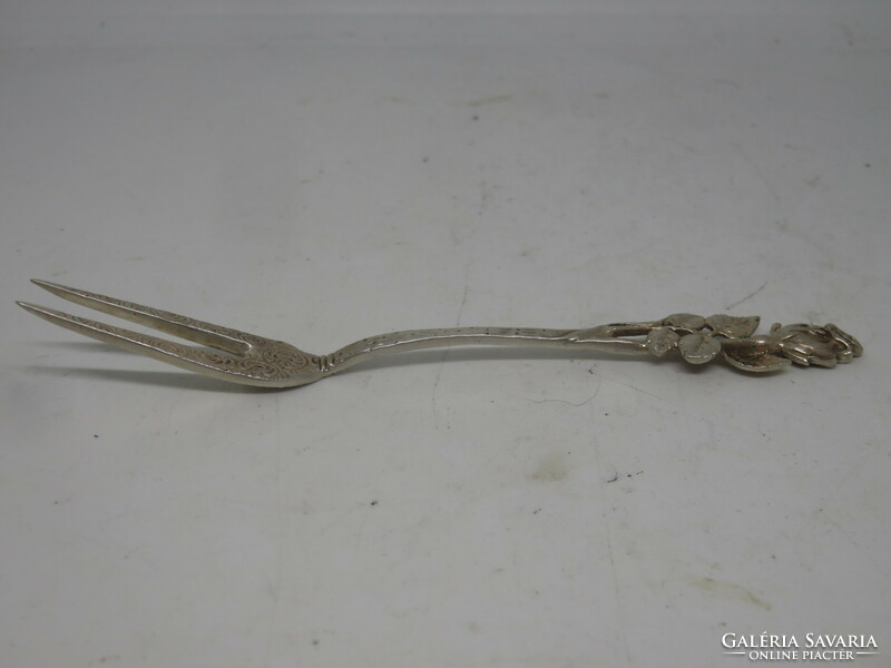 Silver two-pronged small fork with rose decoration
