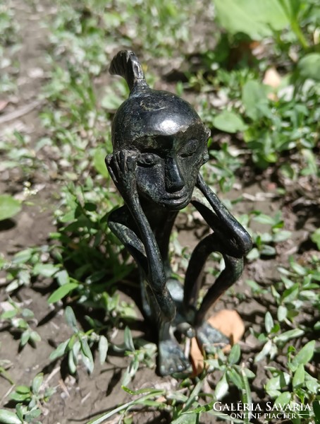 An ancient bronze statue of a male Leti