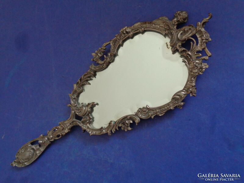 Antique silver-plated bronze hand mirror with an angel