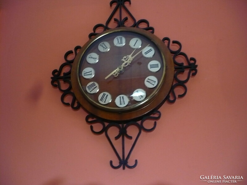 Wrought iron imitation wall clock