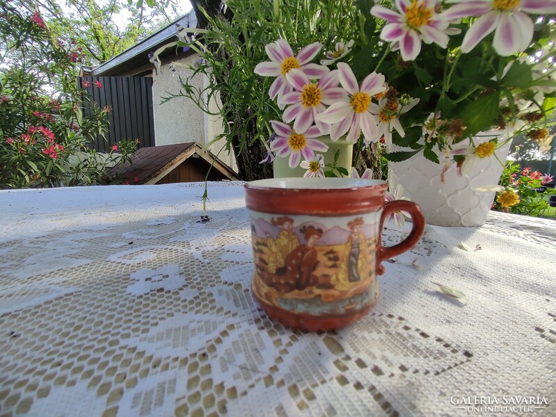 Hand painted porcelain cup