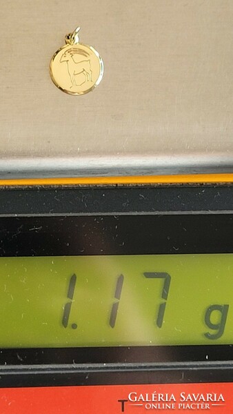 14 K arany horoszkóp medál "Kos" 1,17 g
