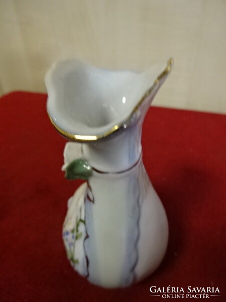 Német porcelán mini váza, maci figura az oldalán, rózsa masnival, magassága 8,5 cm. Emi