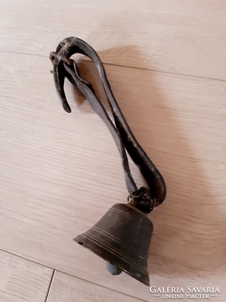 Old copper bell with leather strap, foal bell