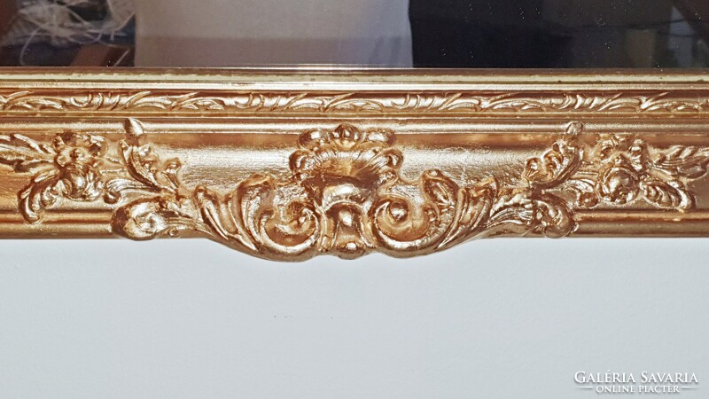 Csodás, antik, arany színű, blondel keretes, nagy méretű tükör. 62x 131 cm.