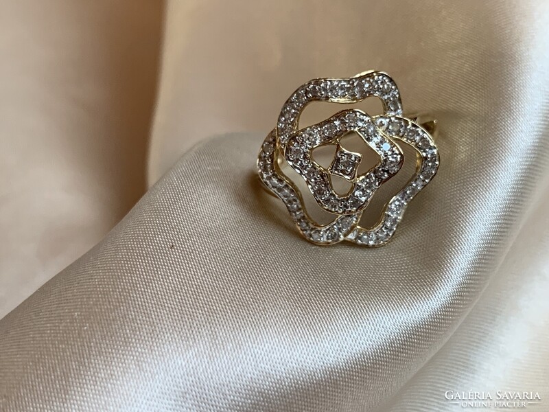 Rengeteg szikrázó  0.41ct gyémánttal 14 kr.arany gyűrű.Igazolással
