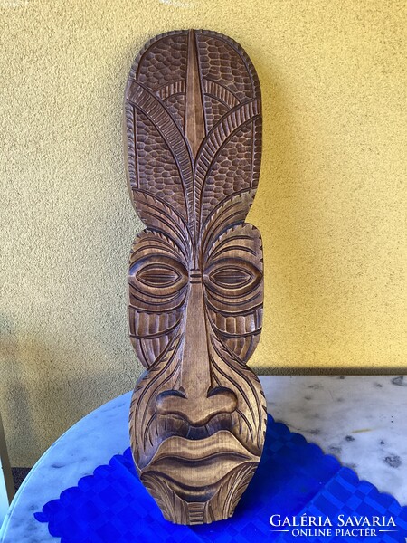 Fából faragott nagy méretű afrikai ihletésű fali kép 67x19 cm.