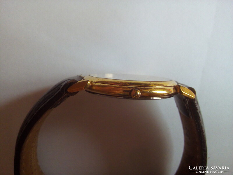 Maurice Lacroix watch with leather strap
