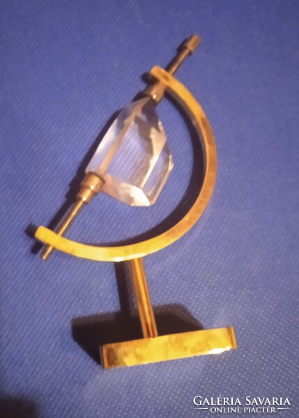 Small 10 cm high brass holder of a crystal in very good condition