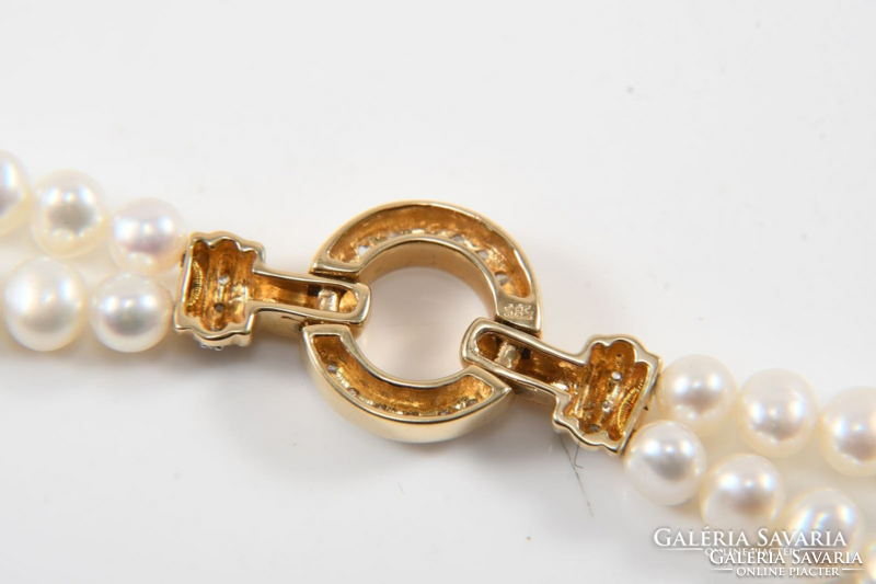 Gyémánt kapocs arany tagokkal dupla soros gyöngy nyakék.Igazolással