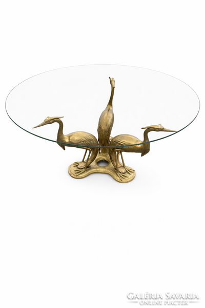 Három daru motívummal díszített bronz kávézóasztal, üveglappal