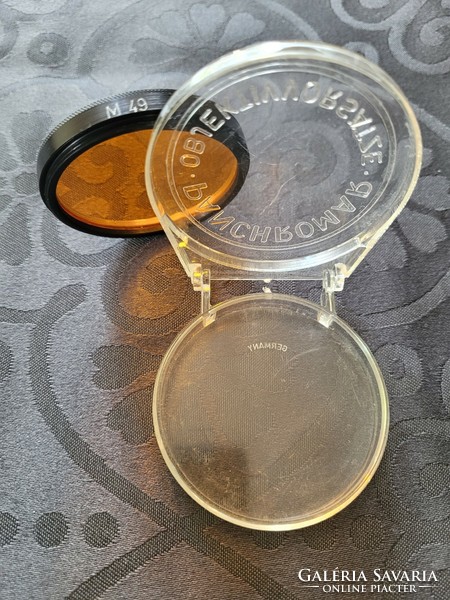 Panchromar M 49 fémkeretes szűrő lencse tokjában.