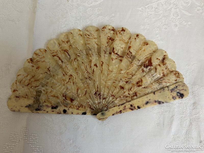 Antique scalloped-edge openwork fan.