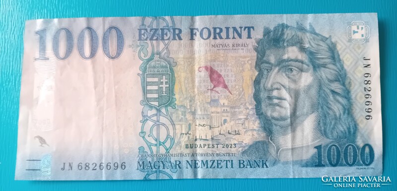 2023 évi 1000 Forintos, jelentős nyomdahibával.