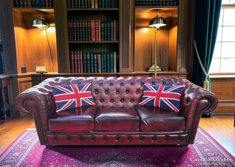 Eredeti Chesterfield antik burgundi színű bőr kanapé.
