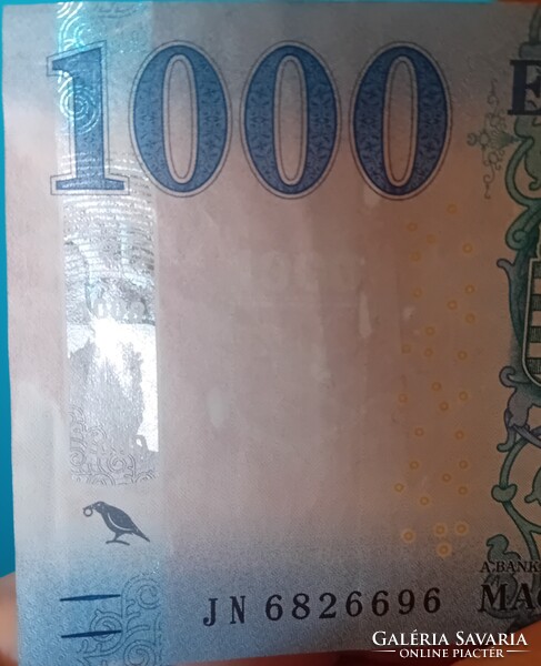 2023 évi 1000 Forintos, jelentős nyomdahibával.