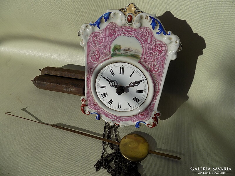 Porcelain-faced peasant clock in good condition. Works well, all original.